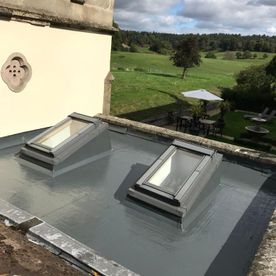 repaired flat roof with skylights